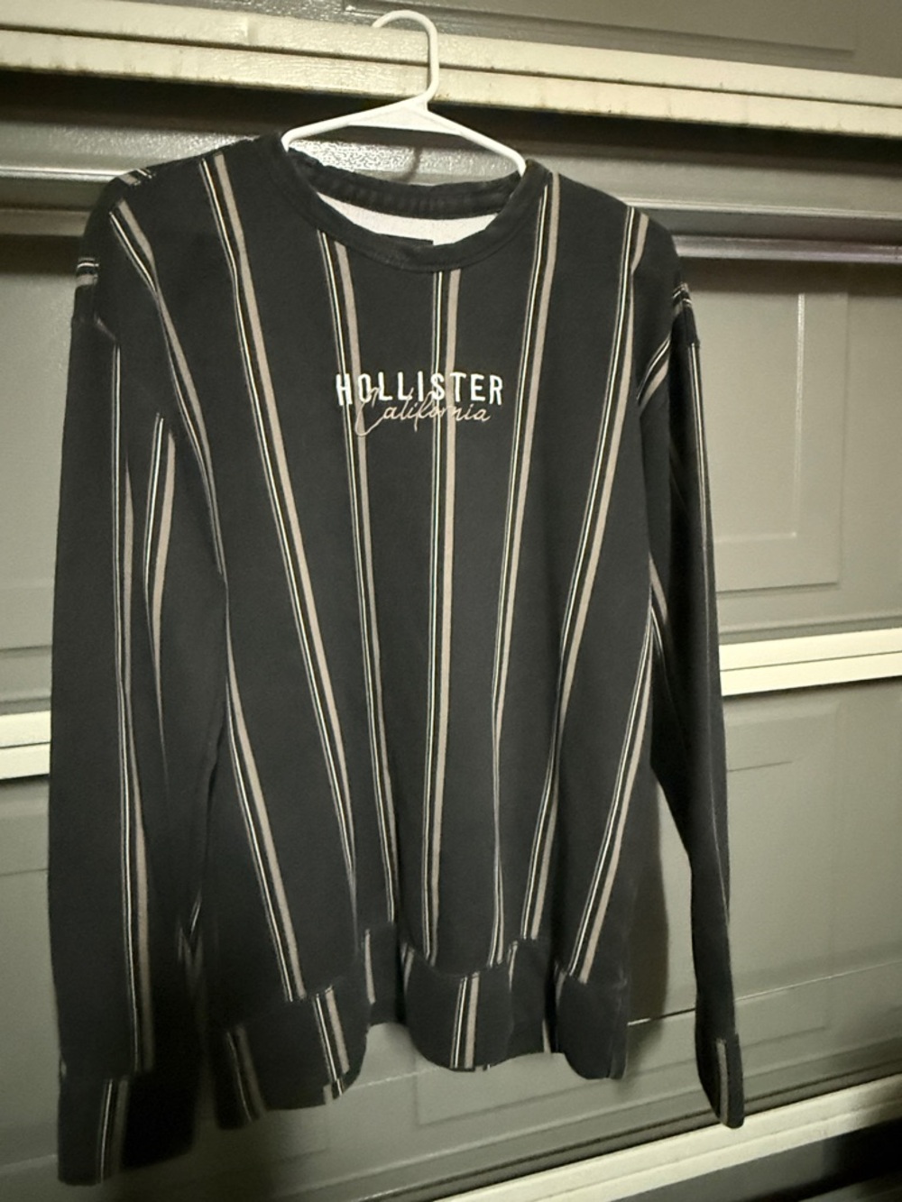 Hollister Black Crewneck Sweater with Cream and Tan Stripes